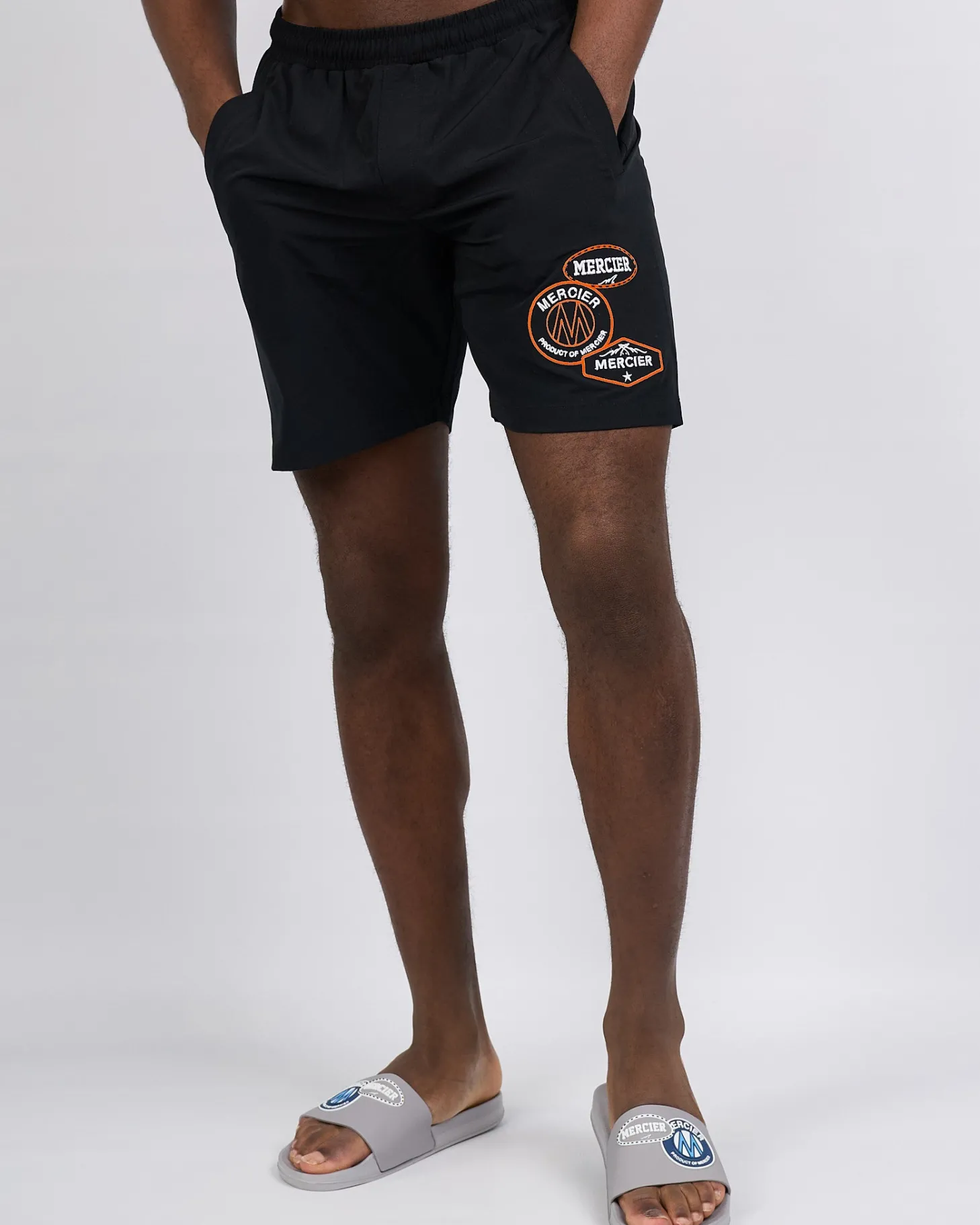 Mercier Summer Sets | Shorts*Black Orange Badge Swim Shorts