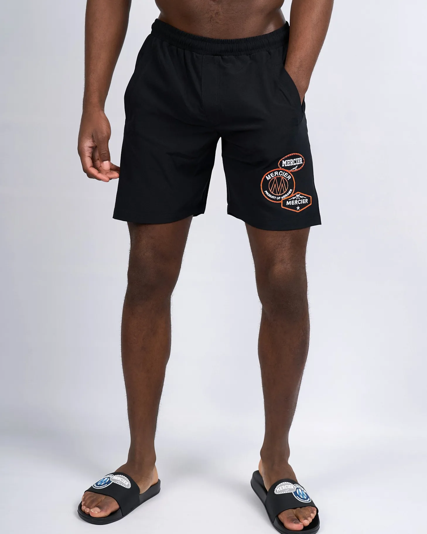 Mercier Summer Sets | Shorts*Black Orange Badge Swim Shorts